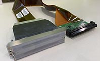 避免平板打印機(jī)uv燈反射造成噴頭斜噴堵頭的方法